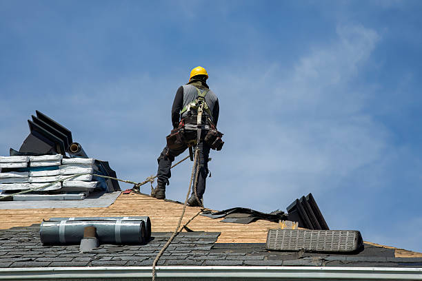 Professional Gutter Installation technician working in Grain Valley, MO